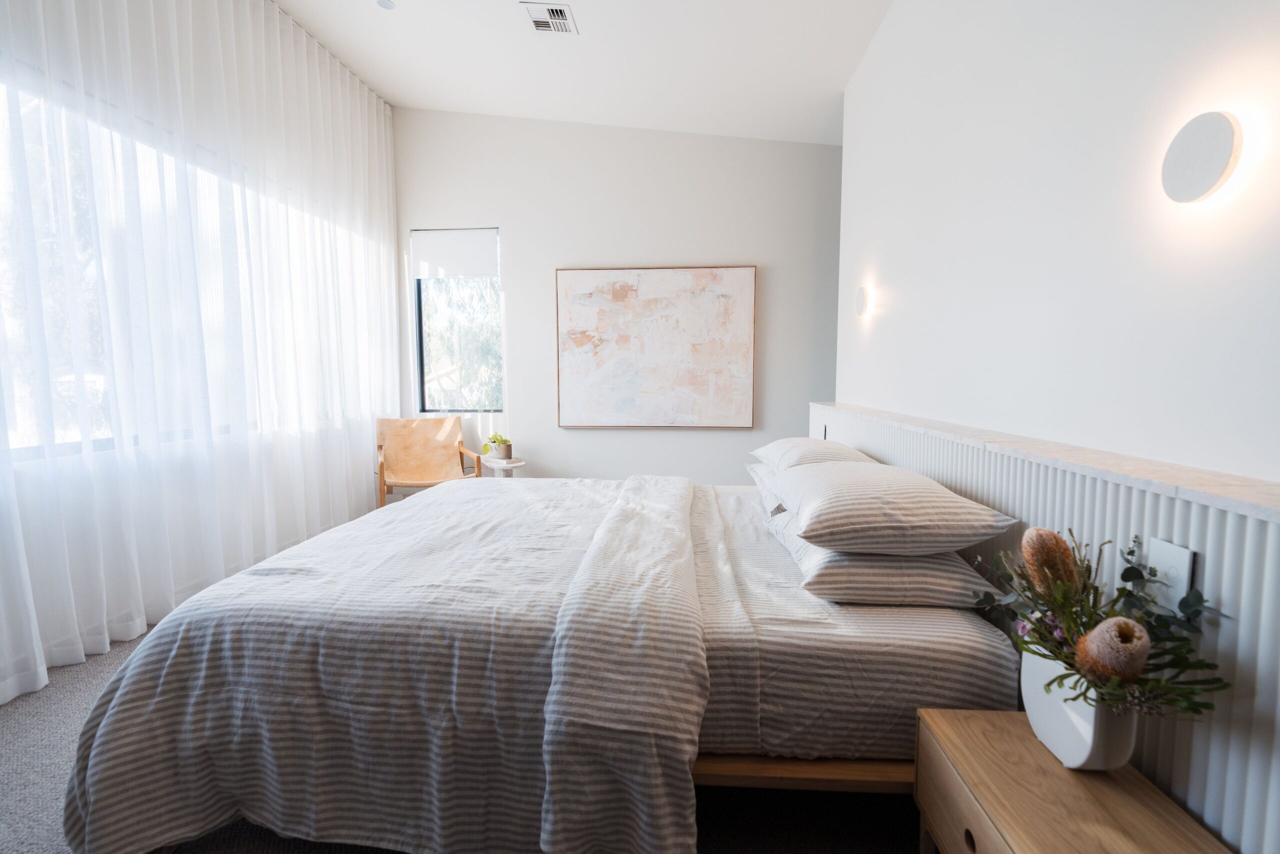 _NH8jLbI White Sheer Curtains with Blockout Roller Blinds layered underneath in a bedroom
