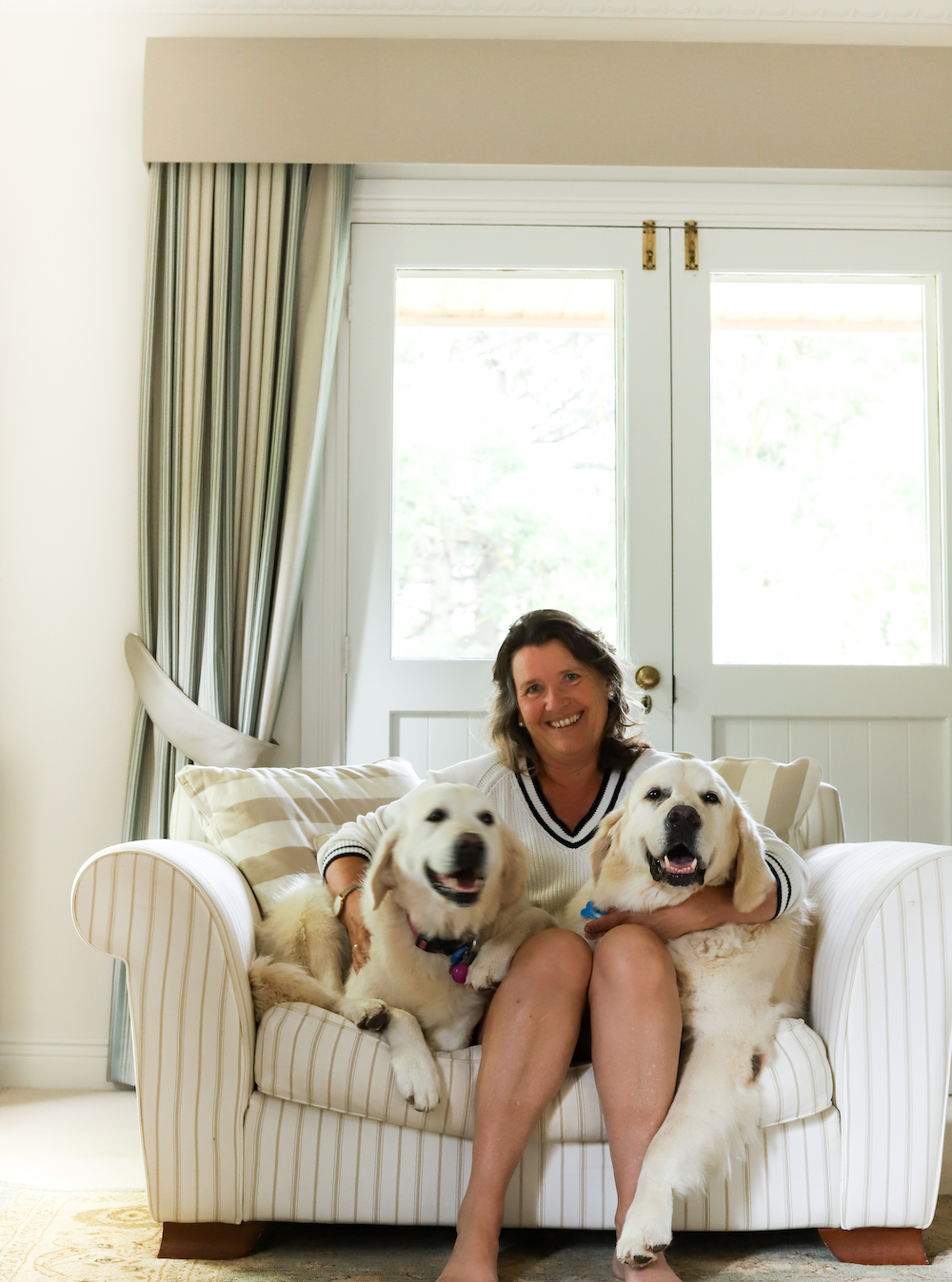 Image of Ali with her dogs. Meet Winnie + Brian.