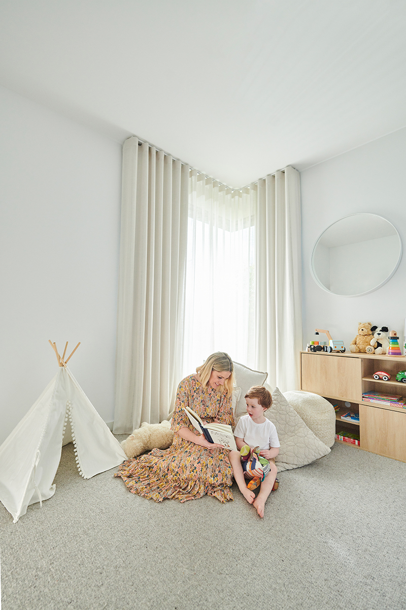 Double Wave Fold Curtains on a corner window